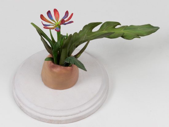 Zachari Logan | Head of Penis Becomes Ditch Flowers (from Enigmas) | 2021 | 4 x 7 x 5 in. | hand-built, hand painted ceramic, paper + wood | SOLD